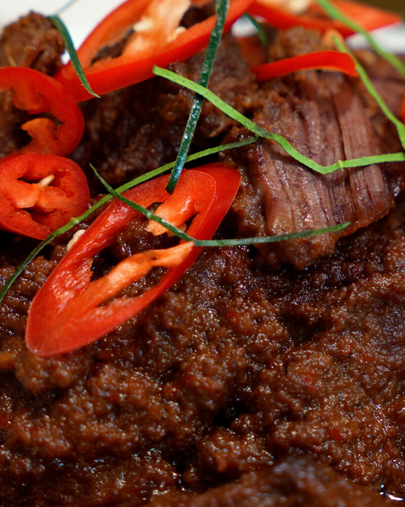 Beef rendang tok cooked until tender with thick coconut sauce