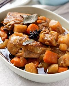 Braised Chicken with Potatoes and Carrots served in a bowl