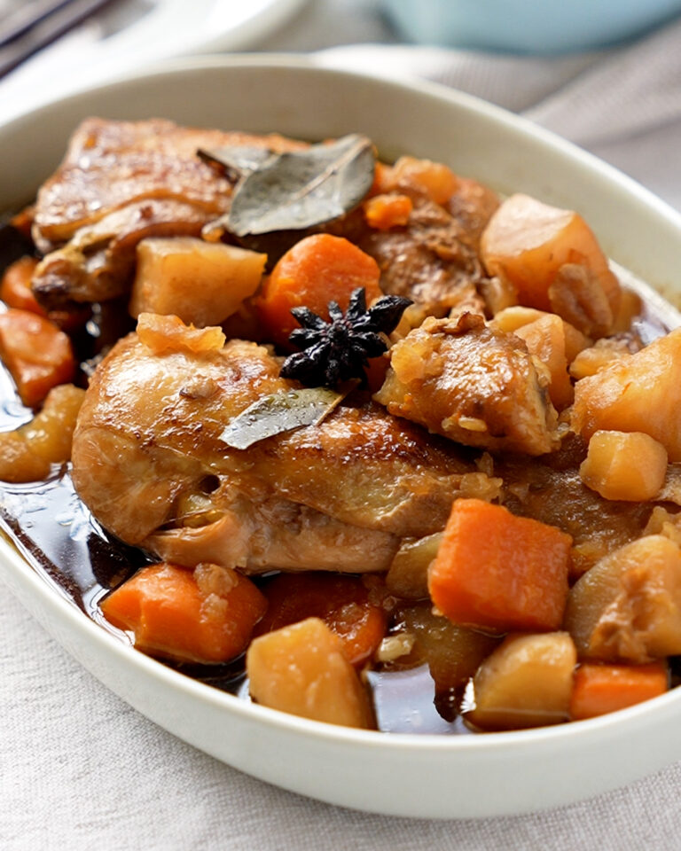 Braised Chicken with Potatoes and Carrots served in a bowl
