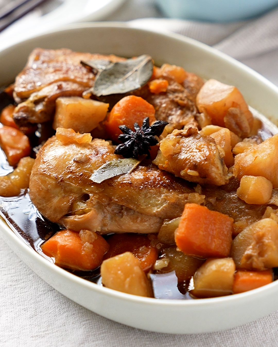 Braised Chicken with Potatoes and Carrots served in a bowl