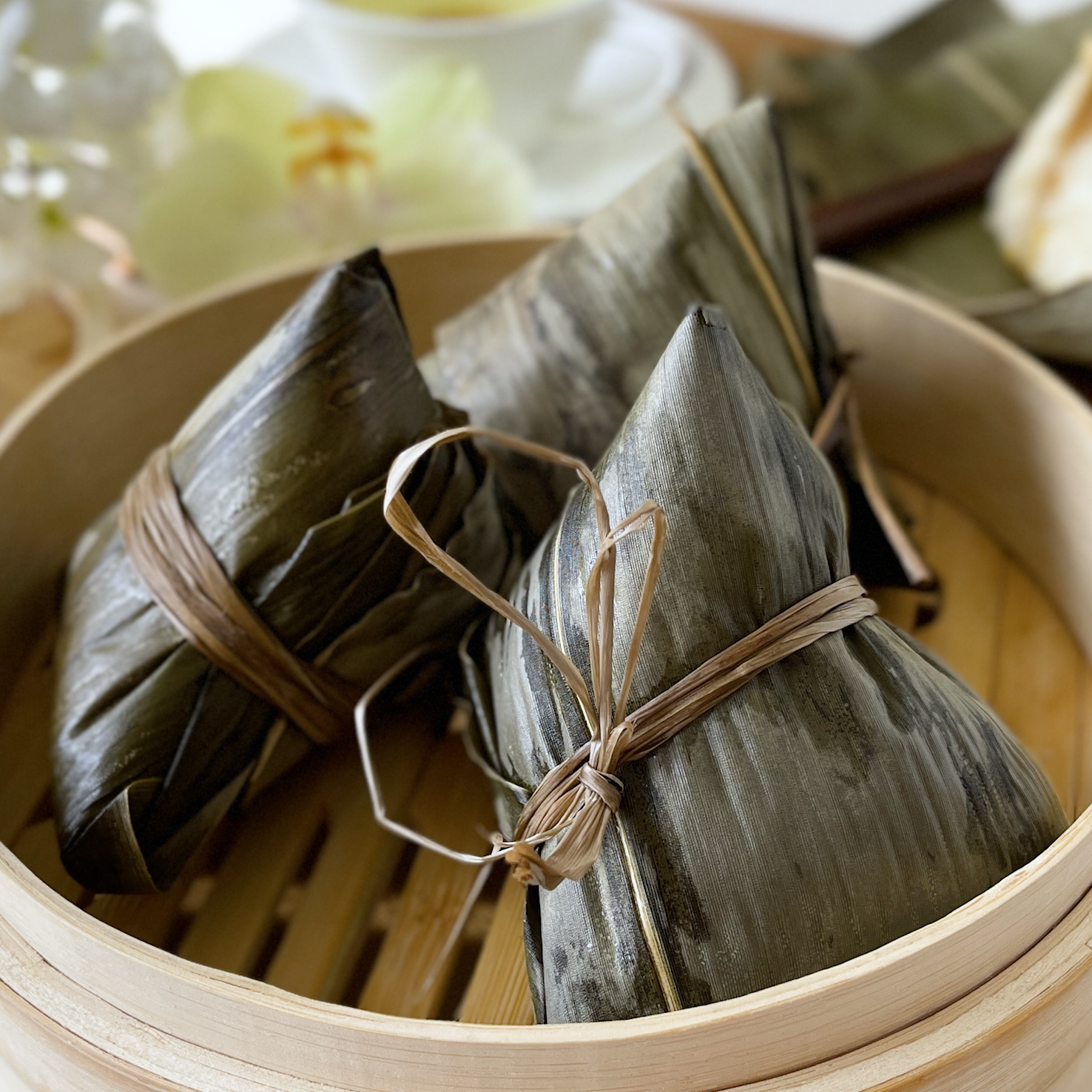 Homemade white Hokkien bak chang on a plate — grandma's family recipe for Hokkien sticky rice dumplings