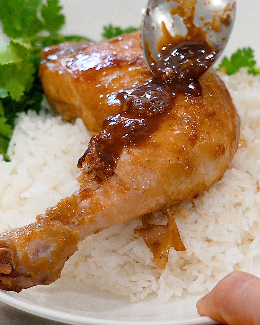 Lemongrass chicken served on a plate with steamed rice and garnish — Ruyi Asian Recipes