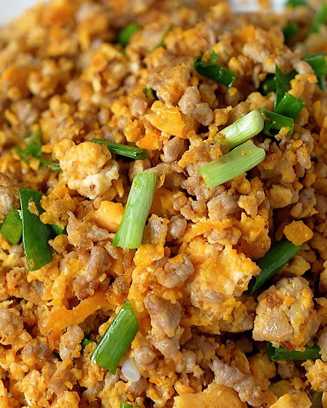 Step by step cooking minced pork and egg stir fry in a cast iron wok