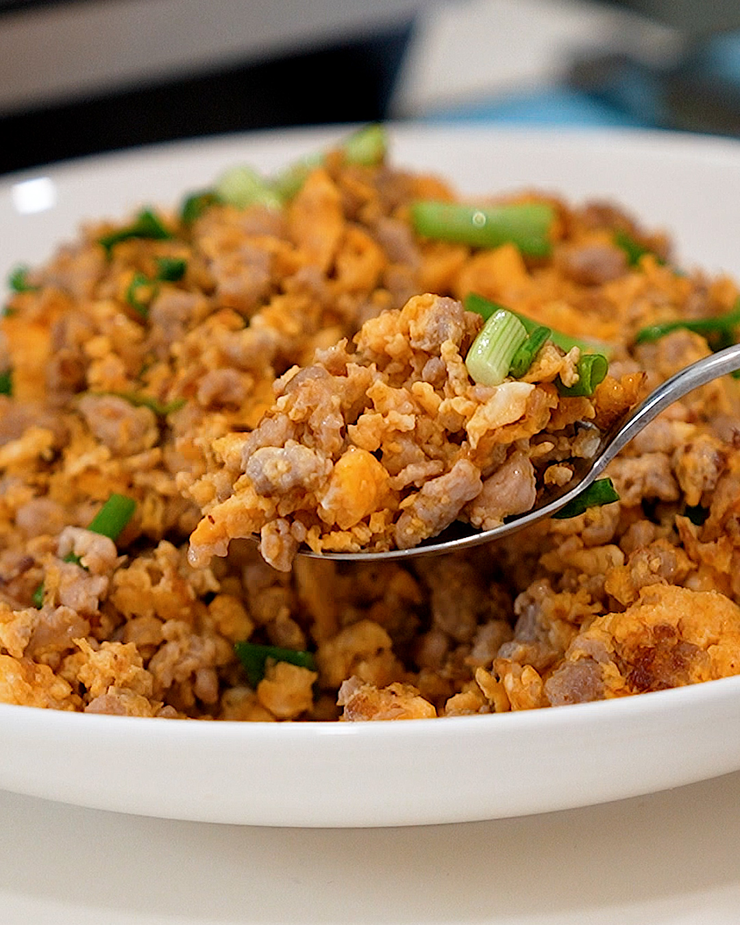 Finished minced pork and egg stir fry served with steamed white rice