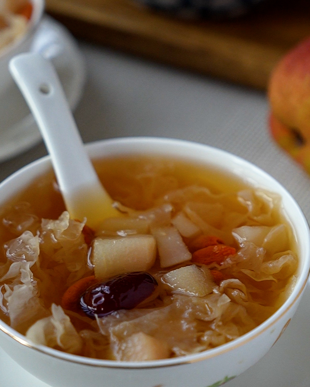 A bowl of Chinese snow fungus with pear dessert soup, a nourishing and naturally sweet tong sui