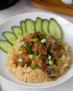 Pork ribs rice cooker recipe served with cucumber slices