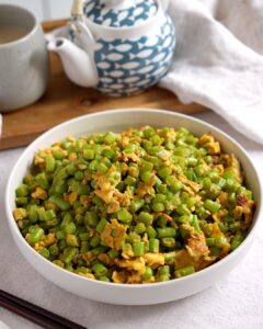 Bowl of french beans with egg stir fry, a quick Chinese vegetable and egg dish