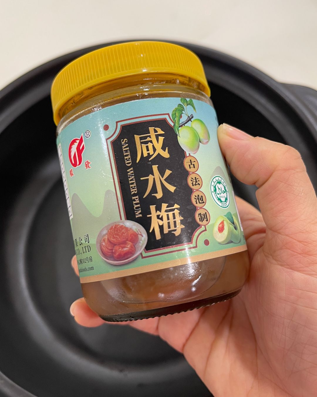 Jar of salted water plum (sour plum) used in sour plum fish soup