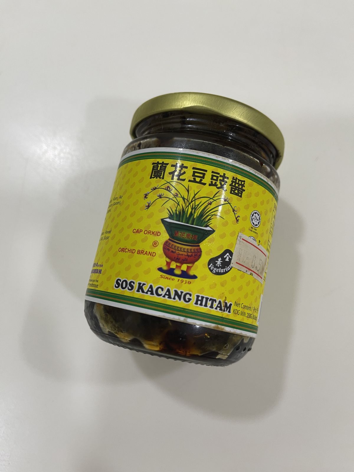 Jar of Orchid Brand fermented black bean paste, sos kacang hitam, used in this beef and green pepper stir fry