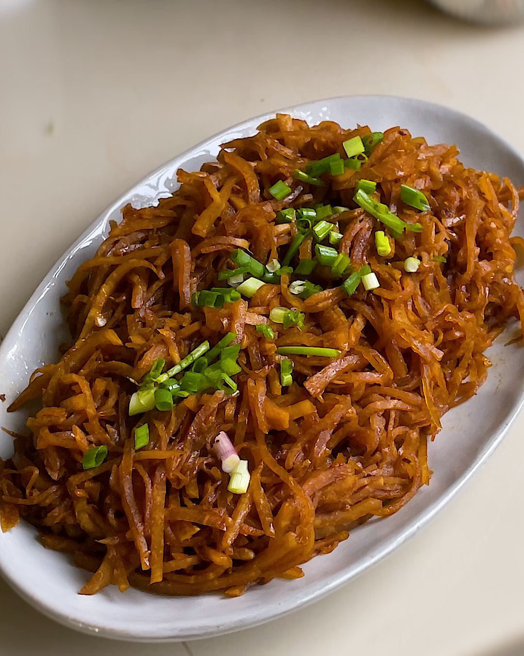 Chinese jicama recipe cooked with dried shrimp and garlic, served in a bowl